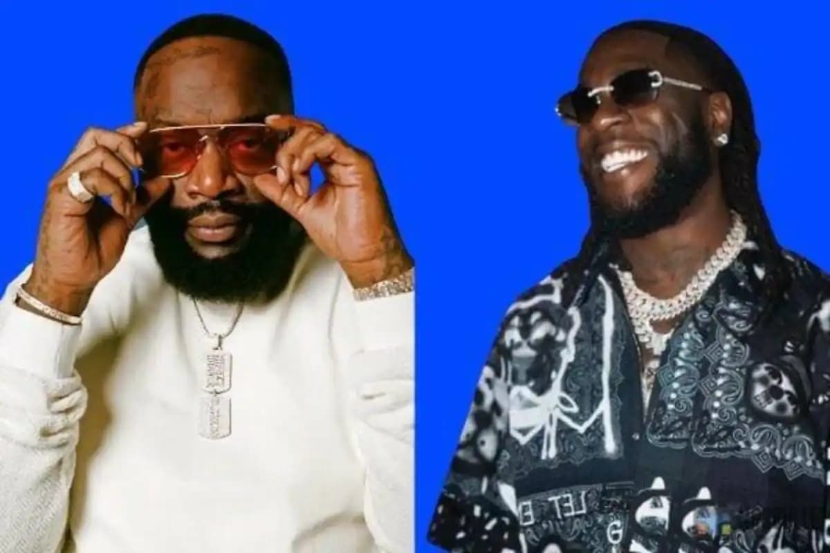 Rick Ross et Burna Boy posent ensemble lors d'un événement musical.